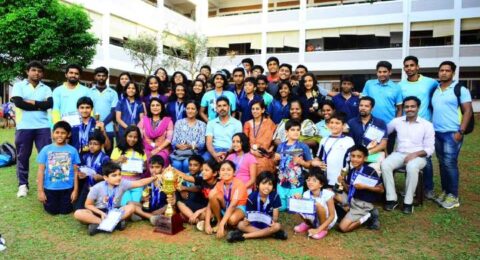 Large group of students gathered for a school programme or assembly