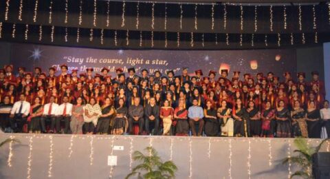 Students performing on stage during a cultural or annual day programme