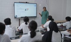 Teacher facilitating inquiry-based learning in an IB classroom at Global Public School