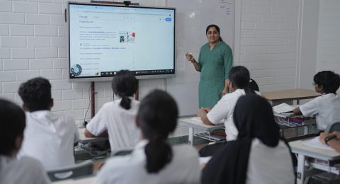 Teacher facilitating inquiry-based learning in an IB classroom at Global Public School