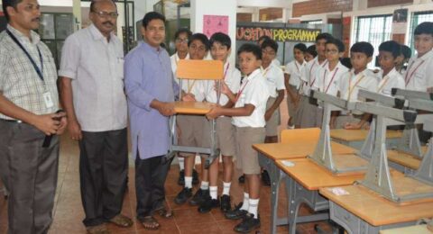 Students engaged in a classroom or lab-based practical learning session