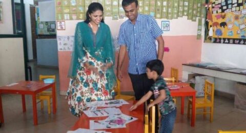 Students engaged in a hands-on classroom learning activity with teachers